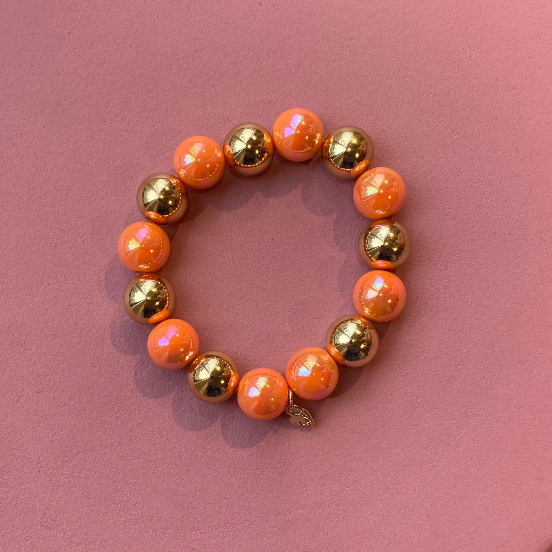 Armband kralen oranje/goud metallic