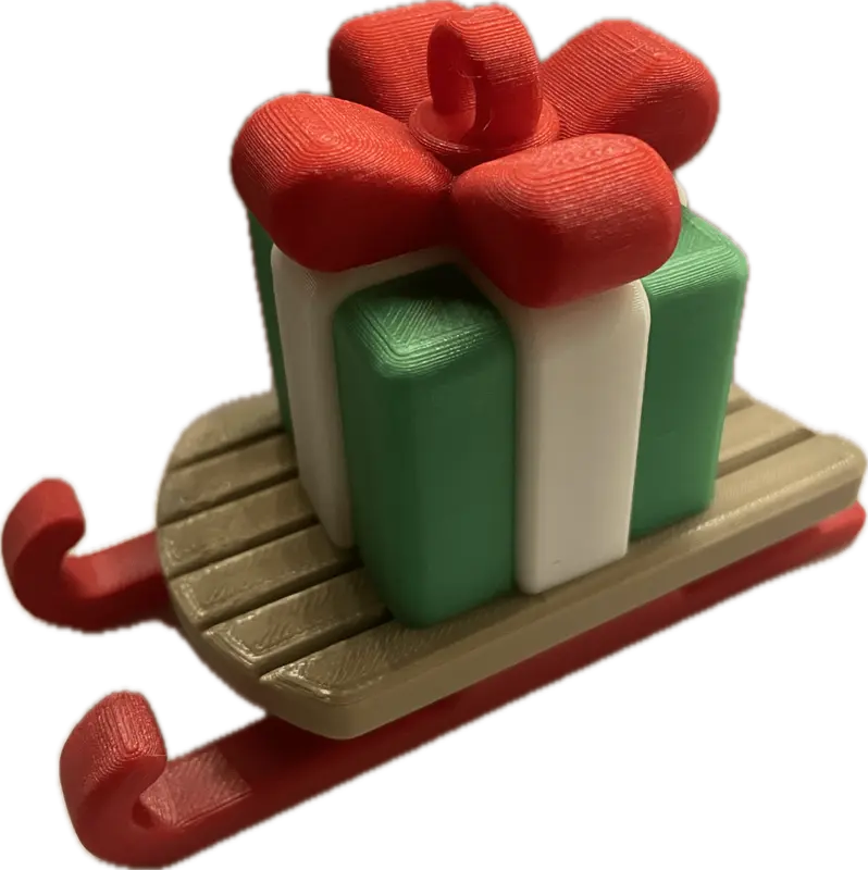 Decoratief cadeau-ornament op slee (grote versie)