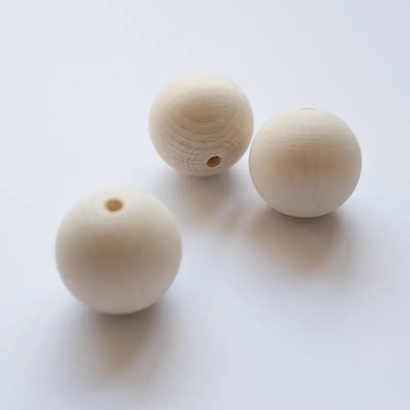 Houten kralen 50mm per 3